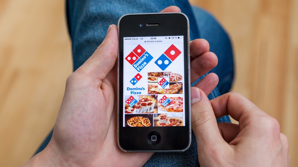 A close up photo of the Domino's Pizza app interface.